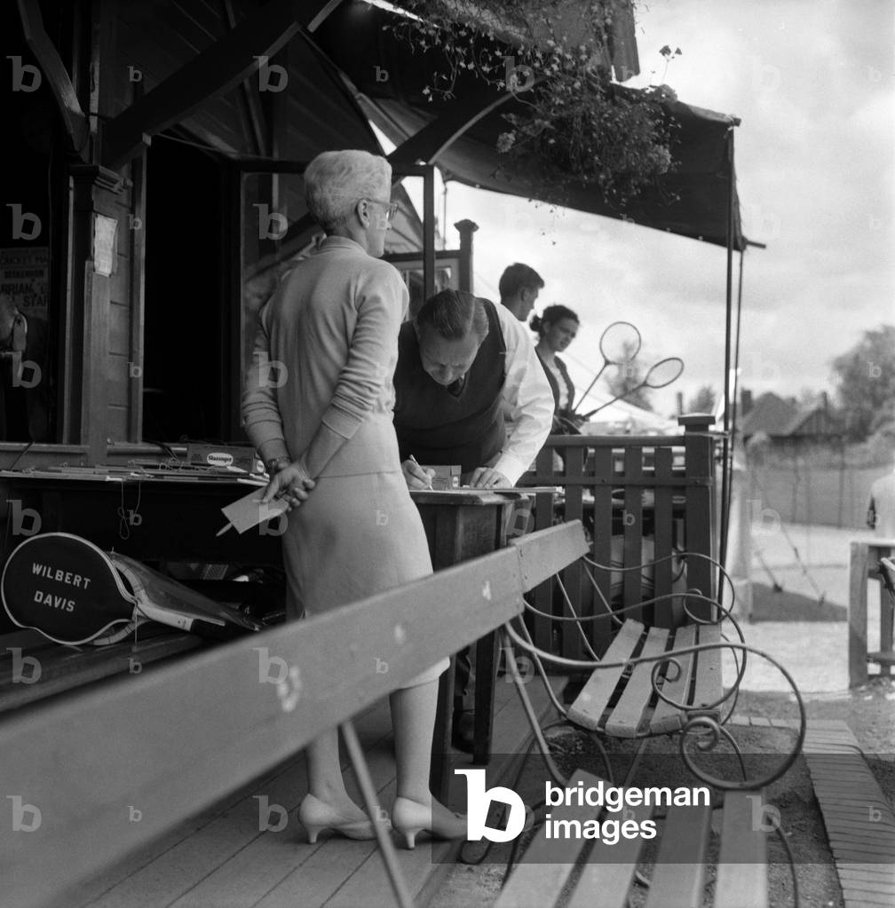 Lawn Tennis at Beckenham. Members watch a game of tennis at the club
June 1960
