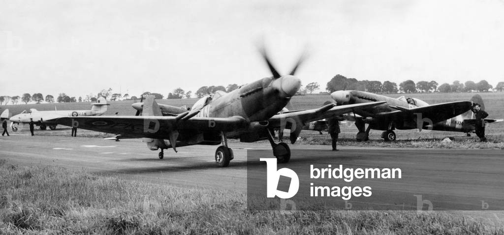 Spitfire fighter planes of 607 County of Durham Squadron, taxi around for the take off at the home of the RAF Station Ouston, commemorating the ninth anniversary of the Battle of Britain. September 1949 (b/w photo)