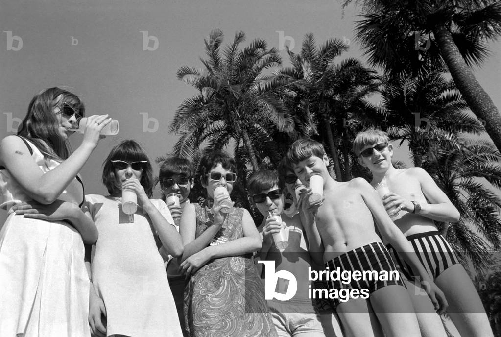 Children on holiday on the beach at Cape Canaveral, Florida, USA. 
November 1969