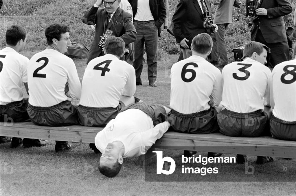 Tottenham Hotspur team having pictures taken by the press before a training session. Dave Mackay opts out. July 1965 1965-1971-014 (photo)