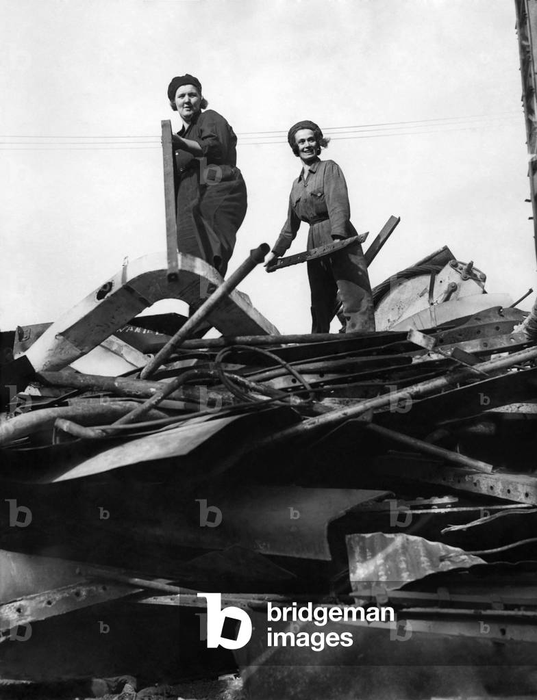 World War II Women. Women salvagers collecting scrap metal. September 1942