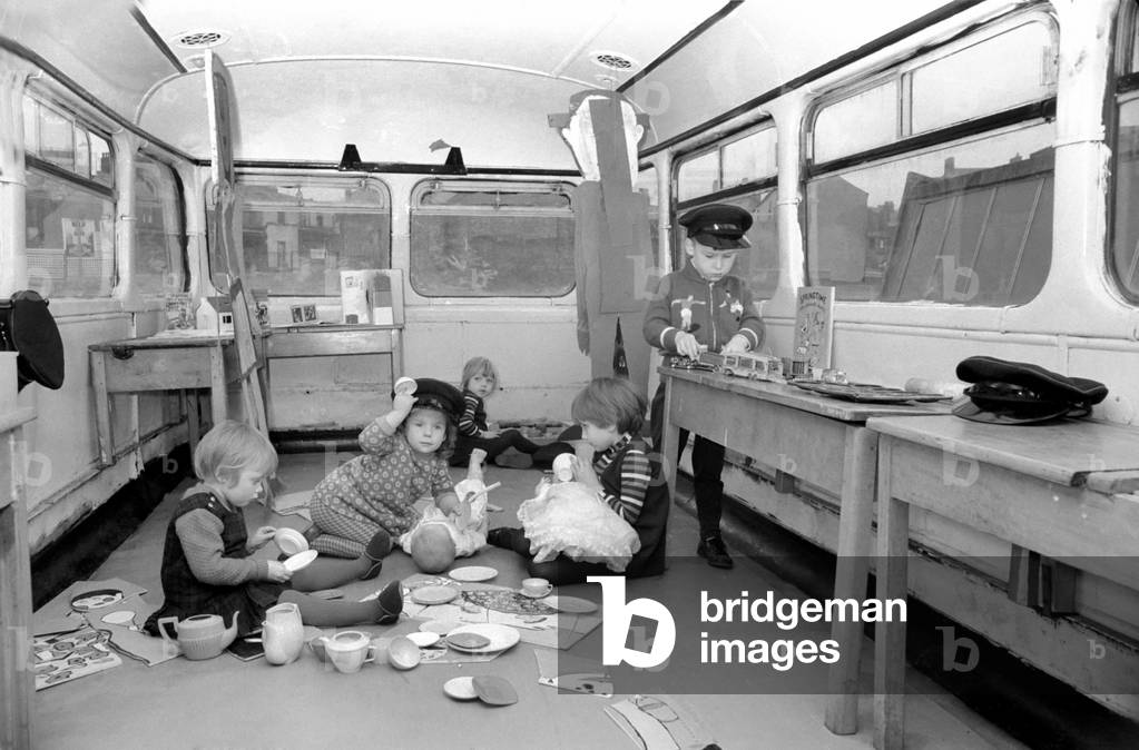 Paddington playmobile on a double decker bus. The first of the youngsters who will use the bus at play on the top deck. 
December 1969