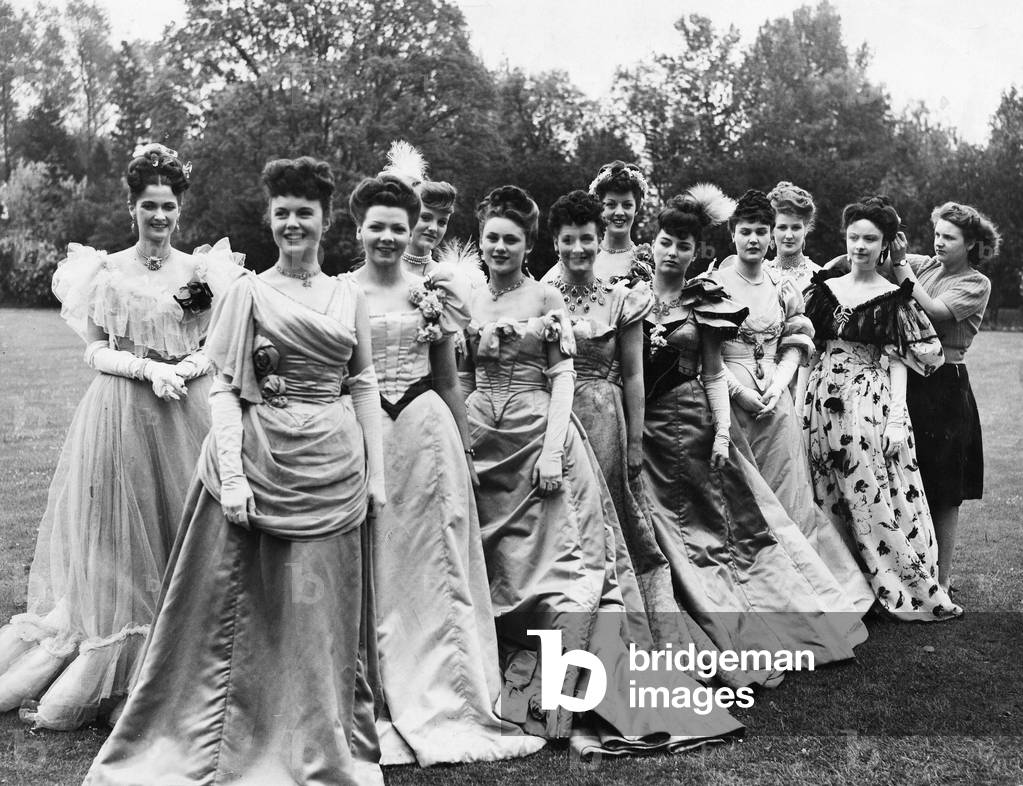 Its not all fun being in films. These show girls all with different hair styles, have to be on parade at Shepperton Studio looking glamourous and with hair perfect at 7am for their part in Sir Alexander Korda's new film 