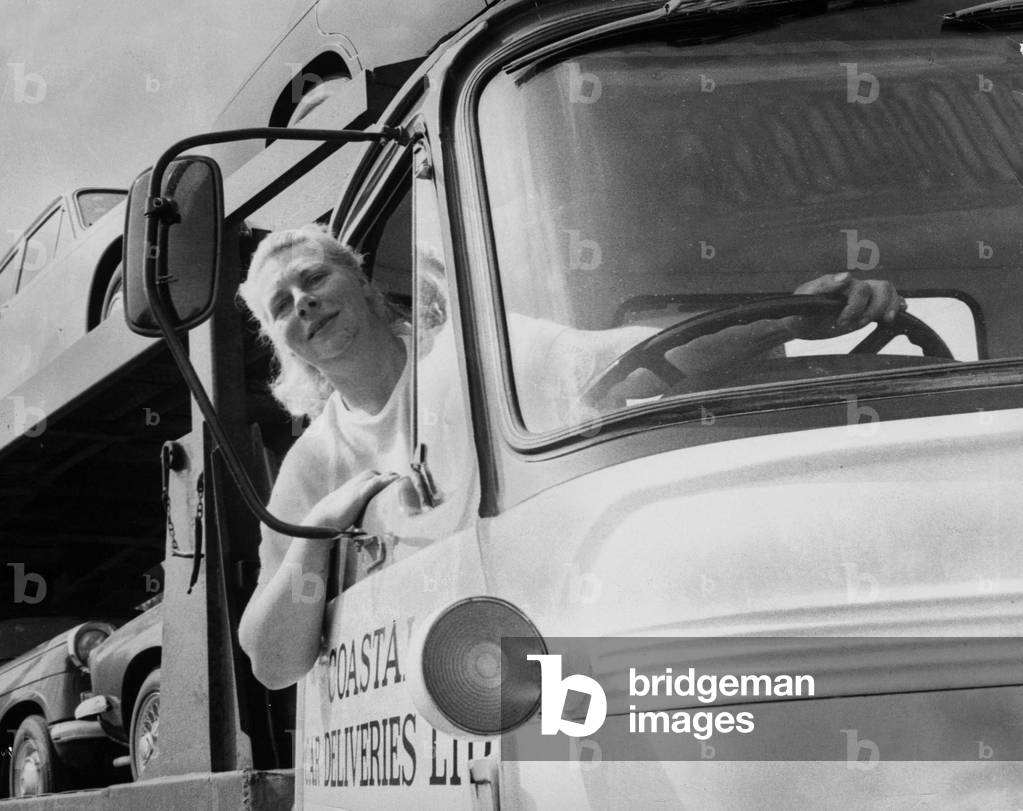 Mrs Pamela Porter of Stretton of Dunsmore near Rugby pictured with her transporter which she owns and drives July 1969 (b/w photo)