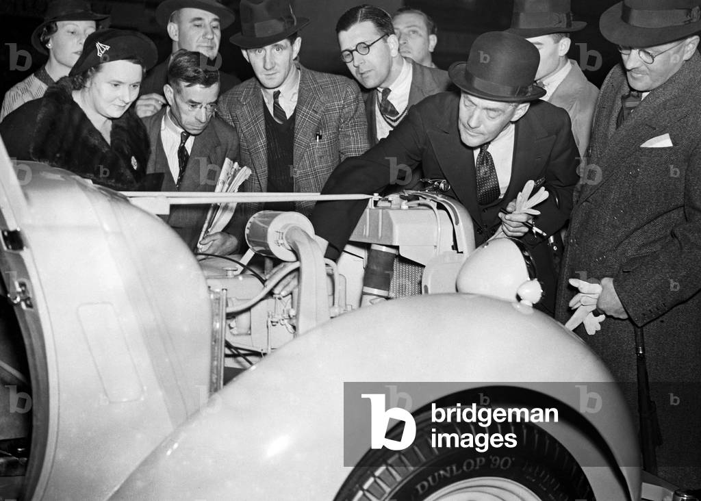 The British International Motor Show held at Earls Court, London held from the 14th to the 23rd October 1937. Lord Nuffield at the Morris stand at the exhibition. 14th October 1937 (b/w photo)