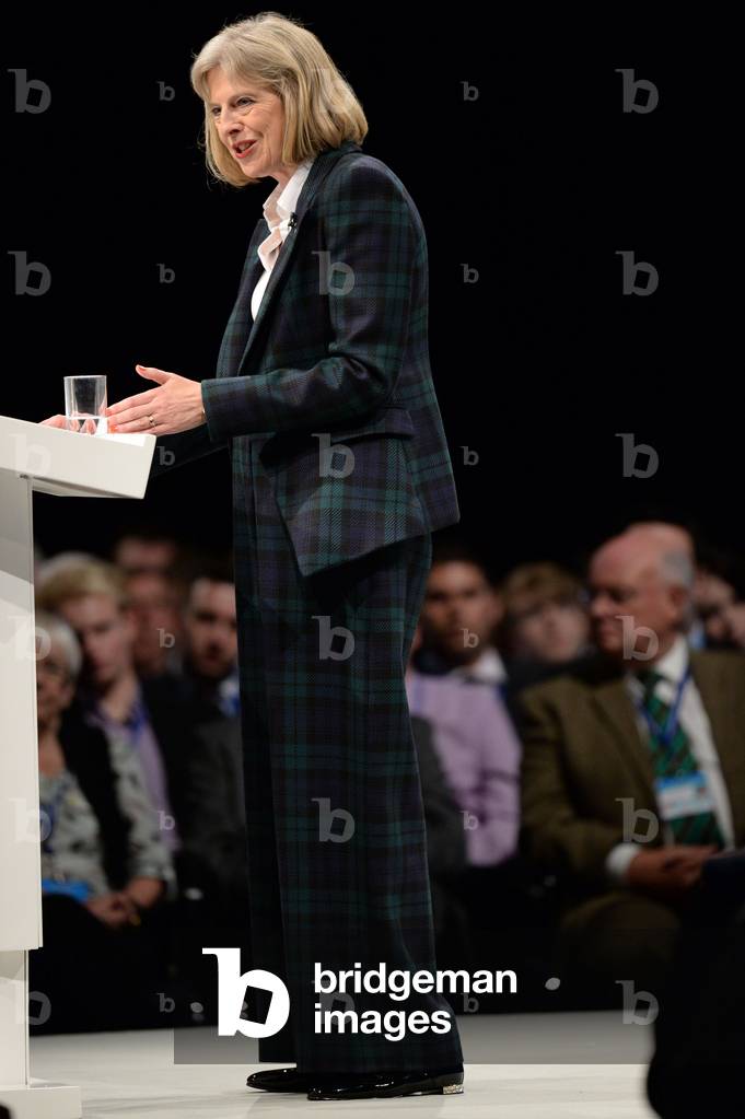 Home Secretary Theresa May delivers her speech in the main hall on the second day of the Conservative Party Conference on September 30, 2013 (photo)