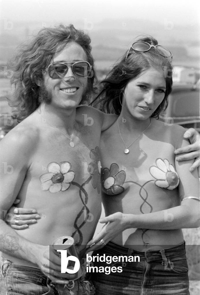 Hippy couple with their chests painted at the Isle of Wight Pop festival.
27th August 1970