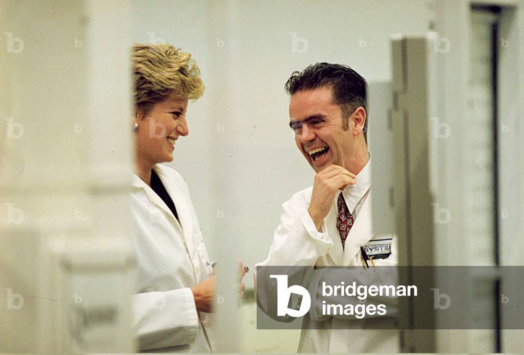 Princess Diana speaking to process manager Steve Baxter at Interconnection Systems, South Shields. 9th December 1992