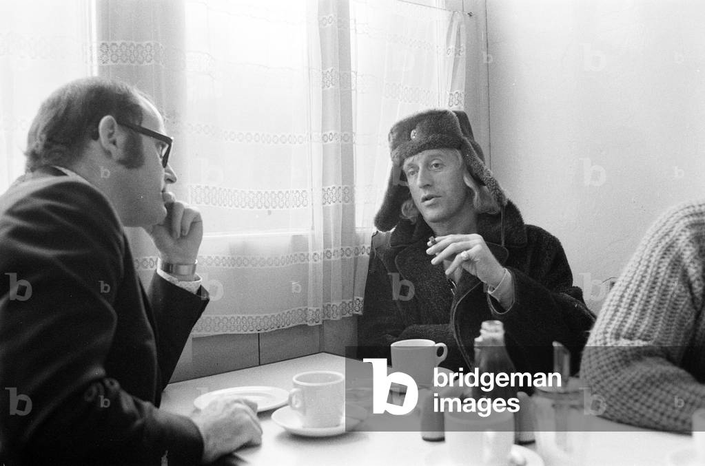 A day in the life of Jimmy Saville' Feature by Mike Hellicar. Here he is pictured in a railway cafe, which he uses for meals and as an office, 7th October 1971 (b/w photo)