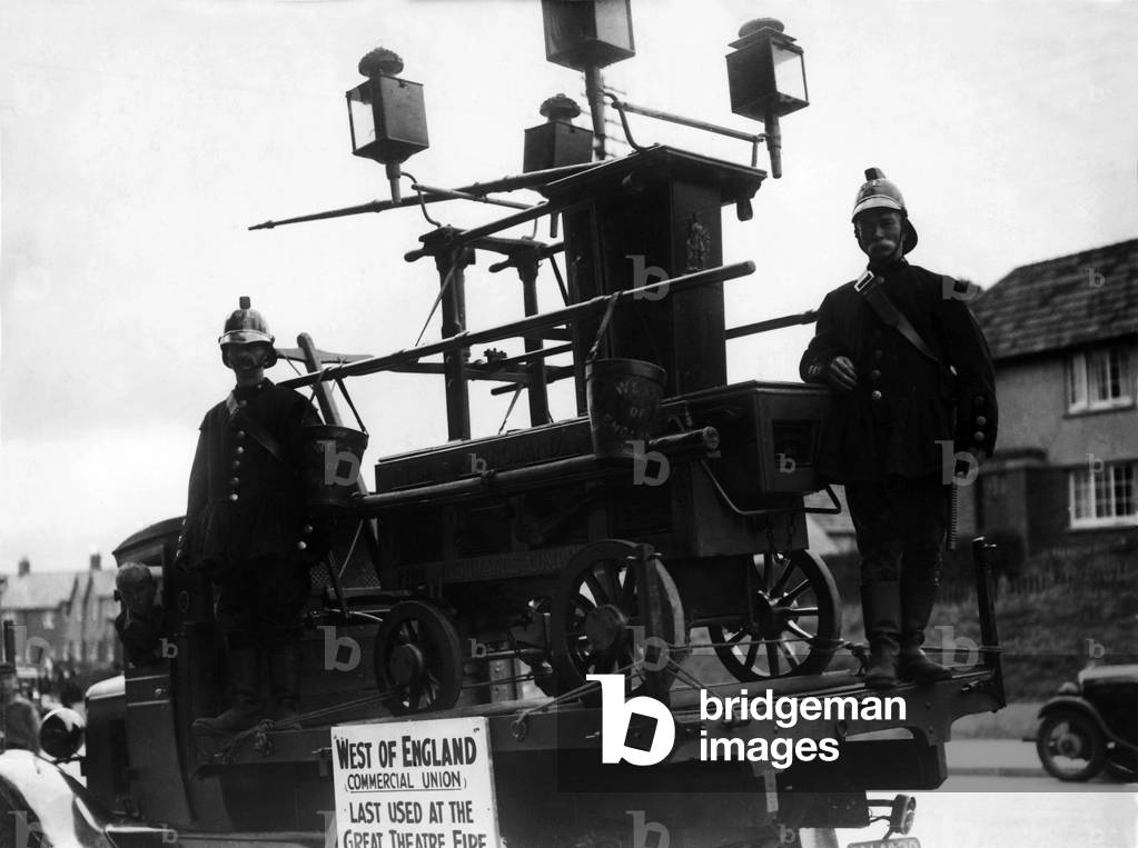 The Fire Engine a hand operated pump seen here at. Exeter. The Engine was last used in the Tragic Theatre fire June 1887. July 1935 P000227