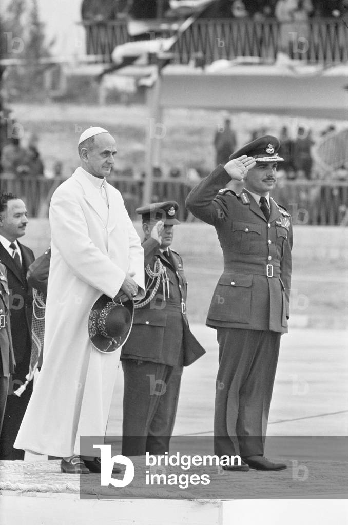 Pope Paul VI beside King Hussein I of Jordan in Amman on January 4, 1964, during a visit to the Holy Land