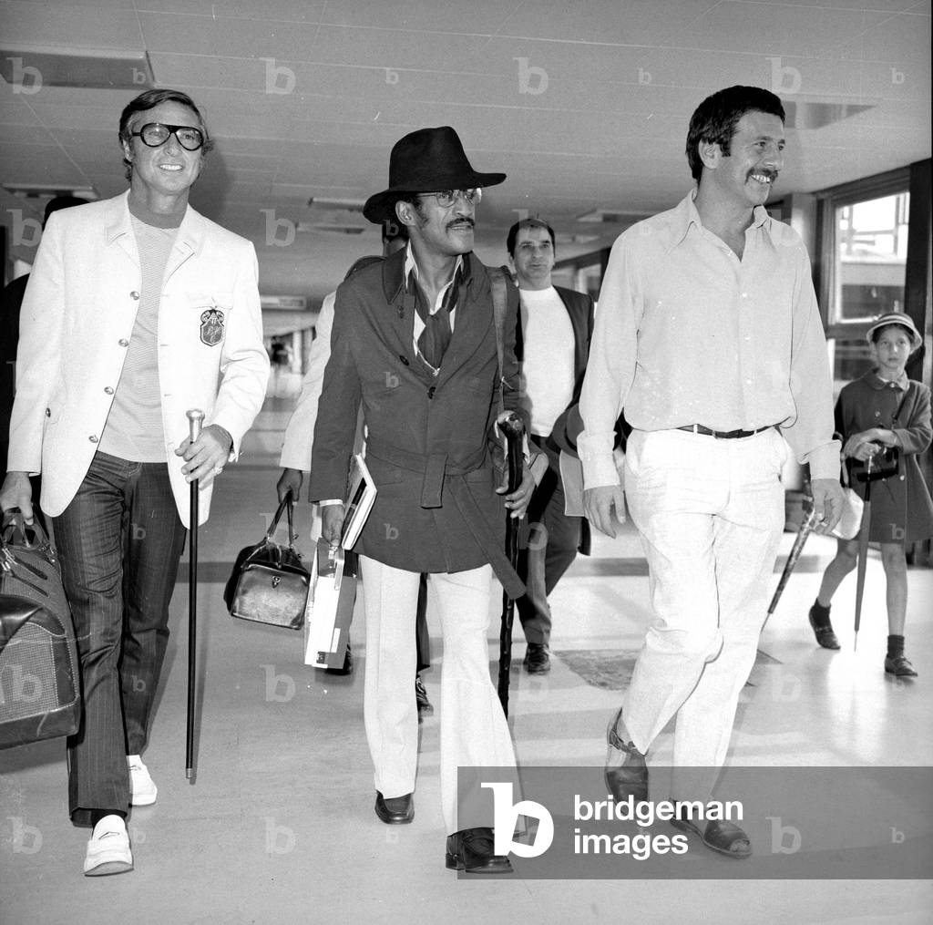 Sammy Davis Jnr at Heathrow, where he is leaving for Tel Aviv with Topol 9th September 1969 (b/w photo)