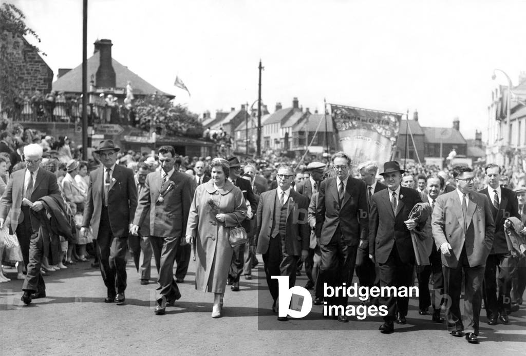 Bedlington Miners Picnic - The leaders walk to the picnic ground in front of the many branches at the miner's picnic. Immediately in front of the banner are Michael Foot, (left) and Mr. E. Jones, Vice Pres. Nat Union of Mineworkers, 11 June 1960