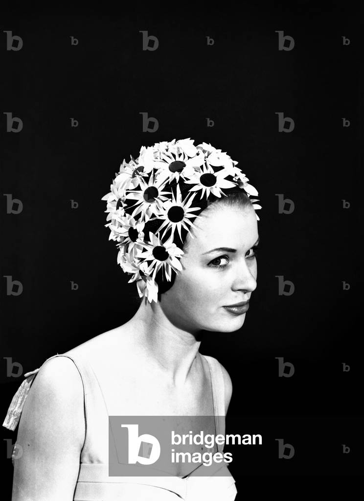 Model Vyvyan Dunbar wearing bathing hats, c. 1963 (b/w photo)