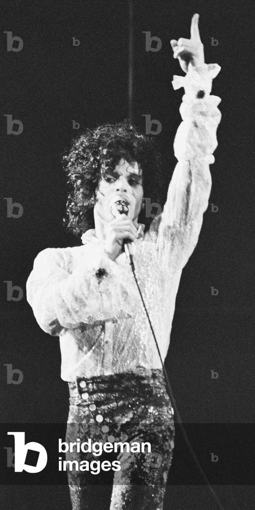 Prince performing on stage at the Joe Louis Arena, Chicago 11th November 1984. The Purple Rain Tour