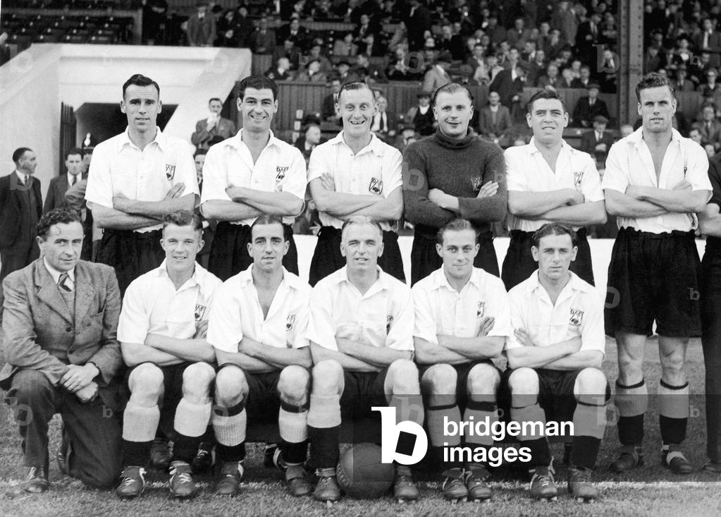 Derby County Football club pose for a team group photograph. They are Back row left to right: Timothy Ward, Leon Leuty, Bert Mosley, William Townsend, Walter Musson, and Jack Howe. Front row: George Antonio, Reginald Harrison, Frank Broome, Horatio 