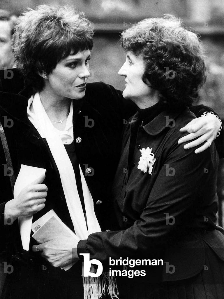 Joanna Lumley comforts a relative at funeral of Anthony Nolan, 25th October 1979 (b/w photo)