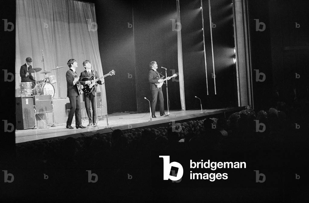 The Beatles performing for the Queen Mother at the Prince of Wales Theatre for the Royal Variety Show.
4th November 1963.