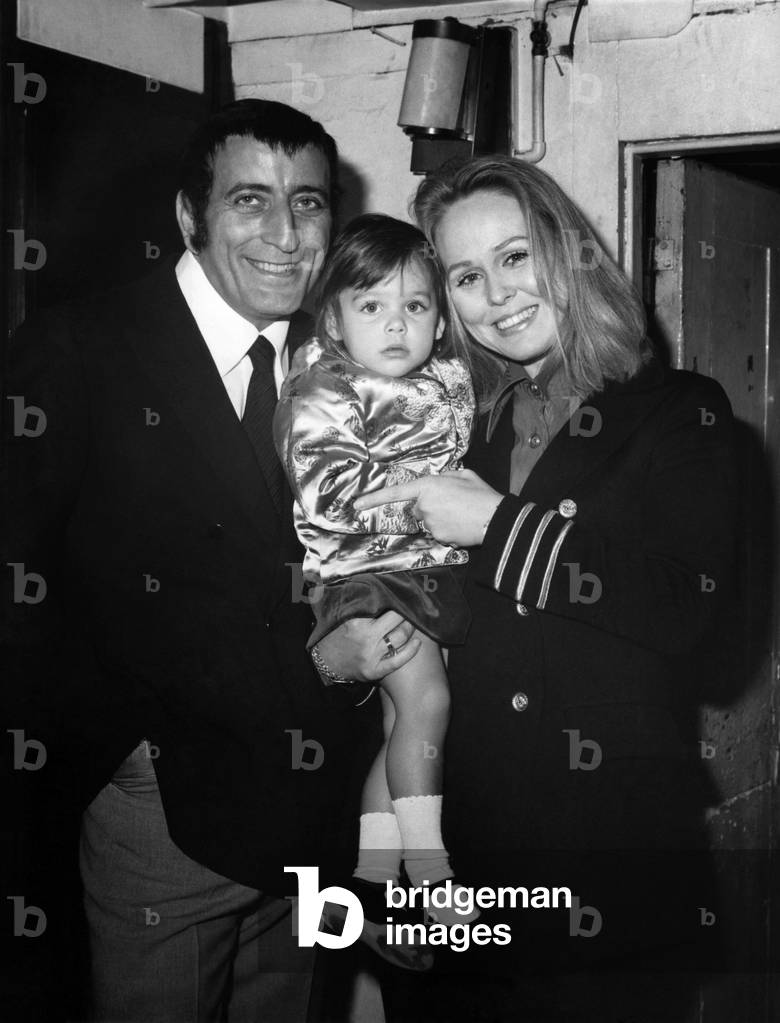 American singer Tony Bennett has never made any secret of his love for actress Sandie Grant. But when they finally married in New York just after Christmas it was in secret. Singer Tony on Tuesday (4-1-72) with his bride Sandie and daughter Joanna. 4th January 1972 (b/w photo)