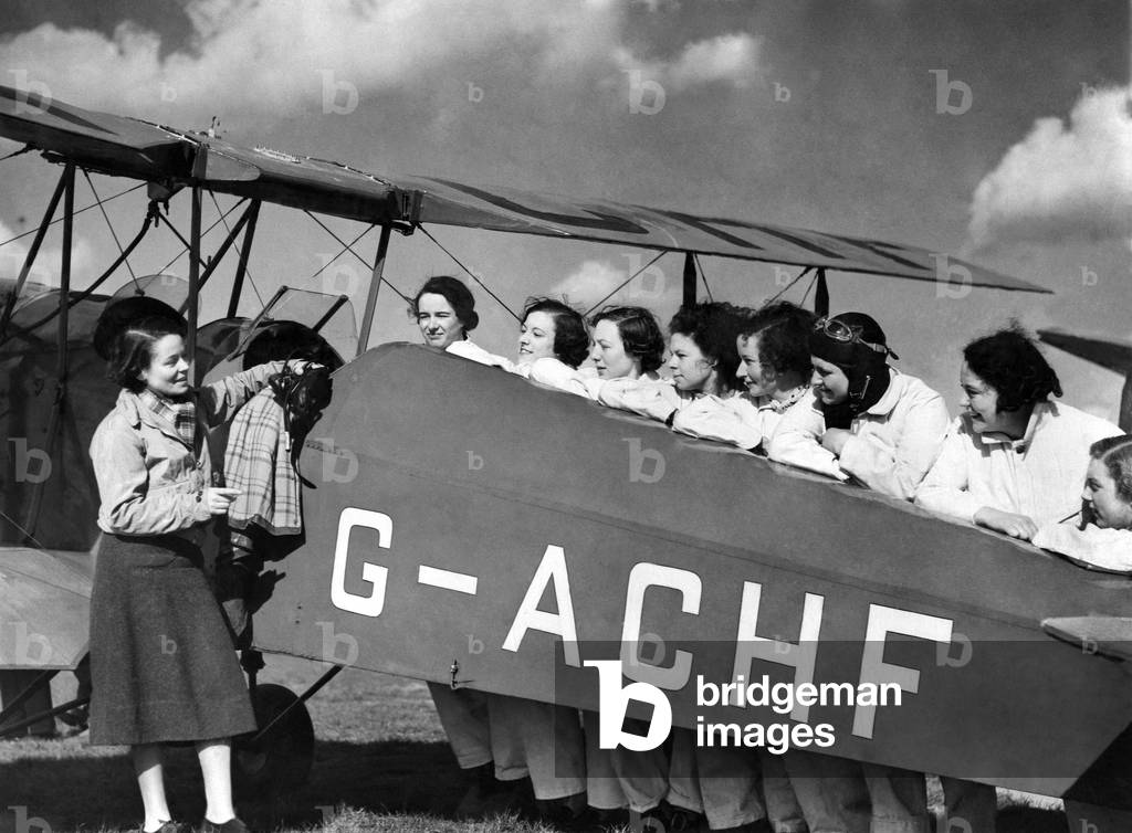 The Womens' Patrol at Romford Flying Club, Mrs. Arthur Patterson the Women's Flying Instructor giving instruction to a class, Essex, 1939
