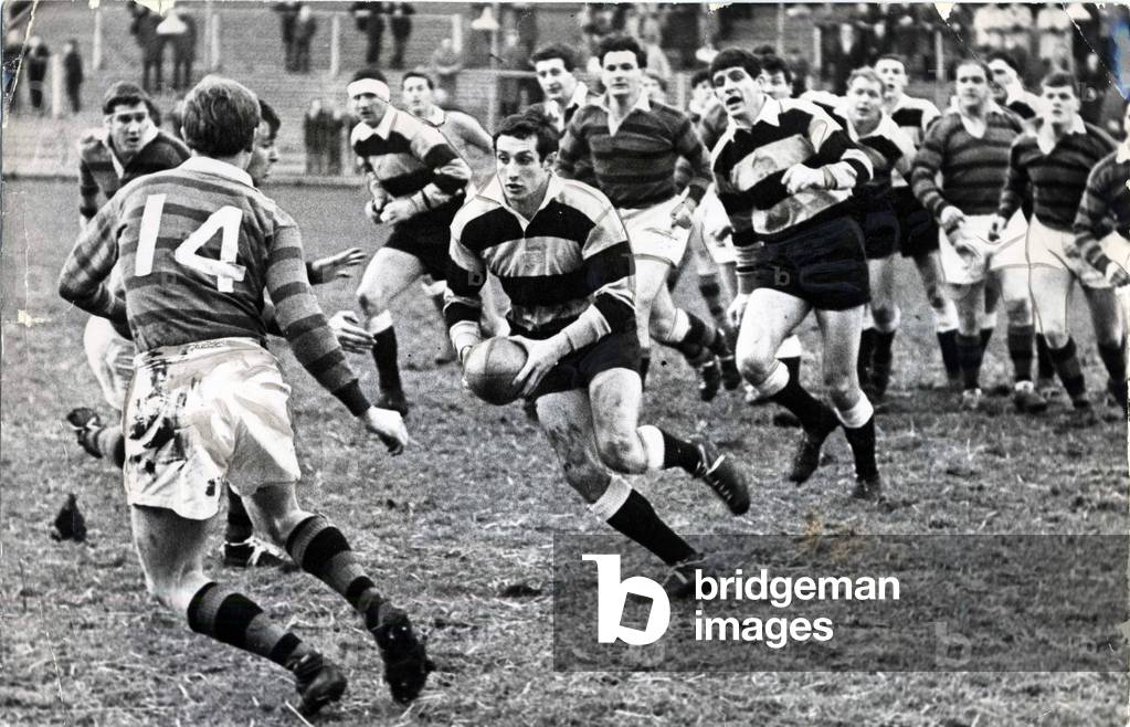 Cardiff v Liverpool rugby union match at Cardiff Arms Park. Gareth Edwards, breaks through with the ball. 23rd December 1967 (b/w photo)