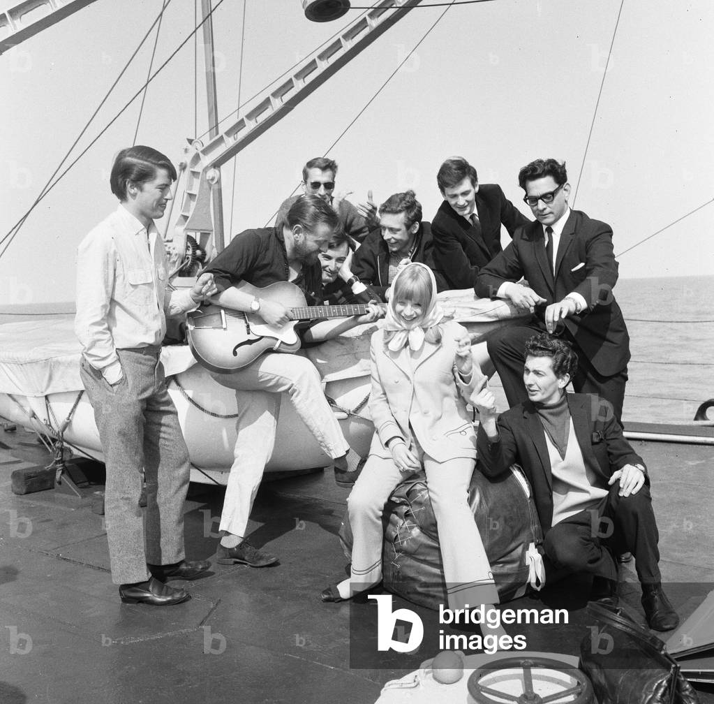 Marianne Faithfull pictured with members of Radio London pictured on the Pirate Radio Ship. 8th May 1965 (b/w photo)