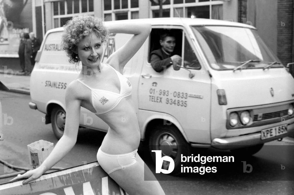 Model Carolyn Wright seen here on the streets of London modelling the 1975 Summer and Autumn Sunarama underwear collection February 1975