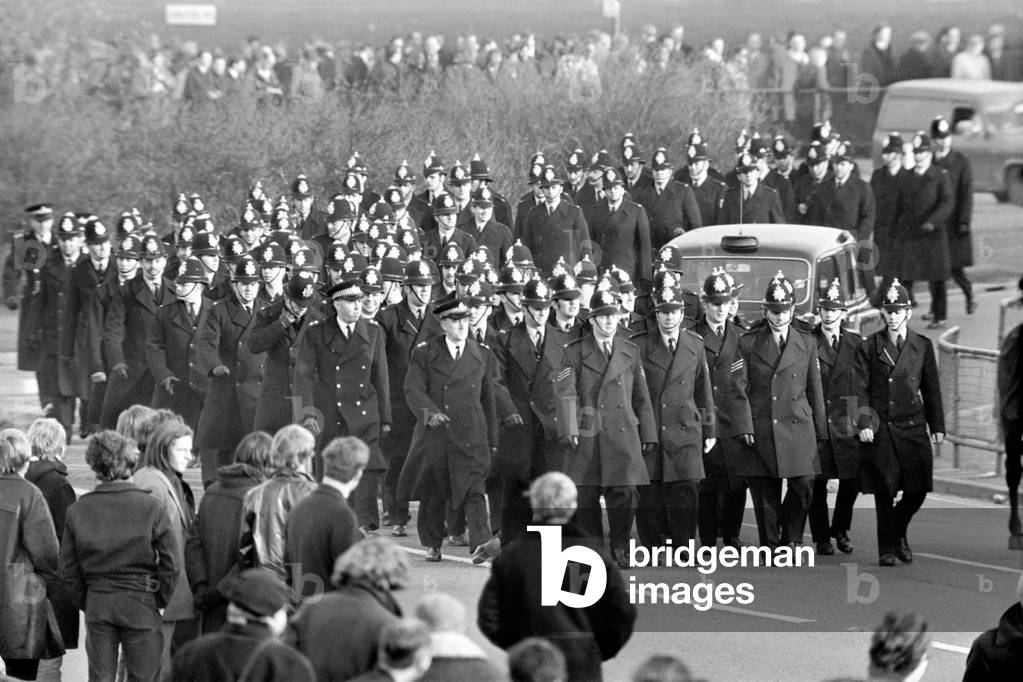 Rugby Union South African Tour: An army of policemen marching towards the white City ground. As students hold a demonstration against the springboks tour of the U.K., due to the apartheid policy. November 1969