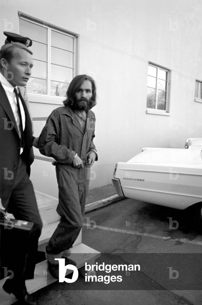 Accused murderer being led to and from court house in Inyo County, California.He is Charles Miller Manson, aged 34 years, 5th December, 1969