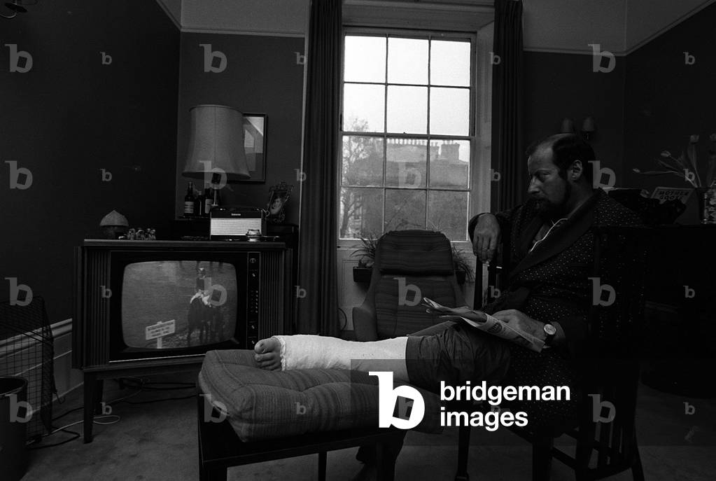 Clement Freud at home with Broken leg March 1969 (b/w photo)
