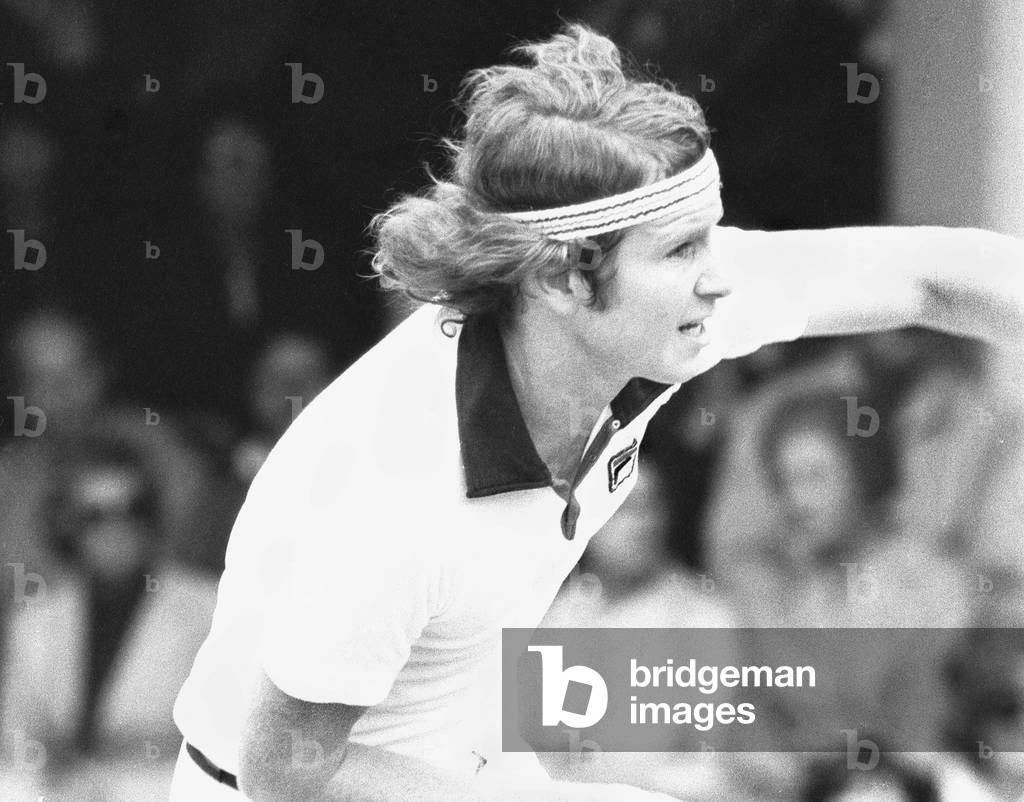 18 year old American John McEnroe seen here in action on Court One at Wimbledon against Australian Phil Dent. McEnroe went on to win and earn him a place in the Mens Semi Final against Jimmy Connors. 28th June 1977