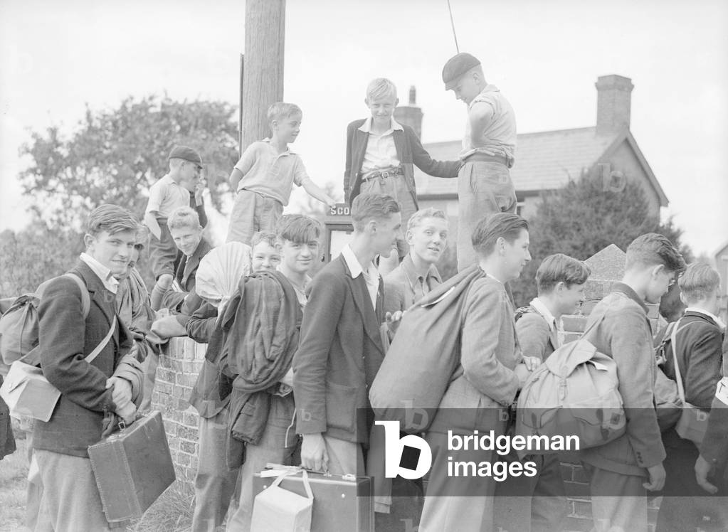 Schoolboys evacuated from London arriving at a village hall in the home counties awaiting collection by their surrogate families, 3rd September 1939 (b/w photo)