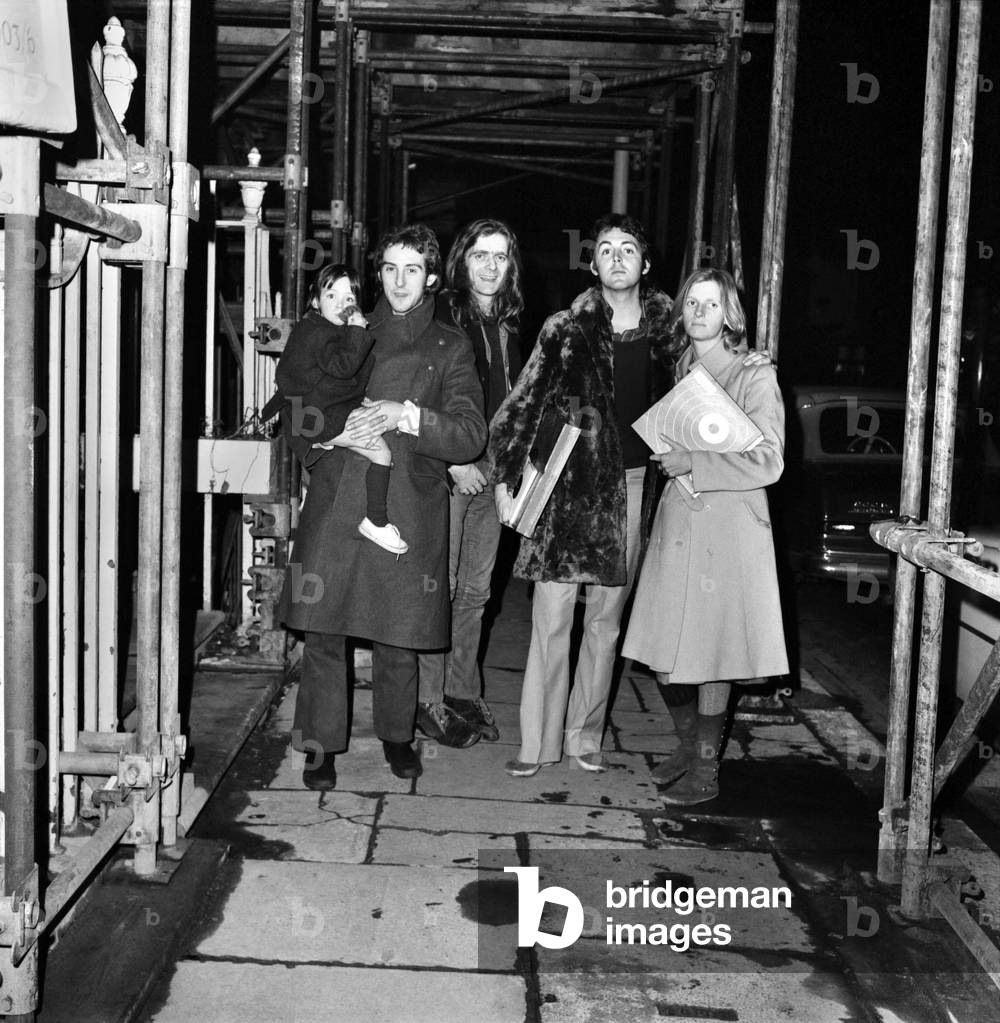 L-R Mary McCartney being carried by Benny Lane, Billy McCaldrey, Paul and Linda McCartney. February 1972
