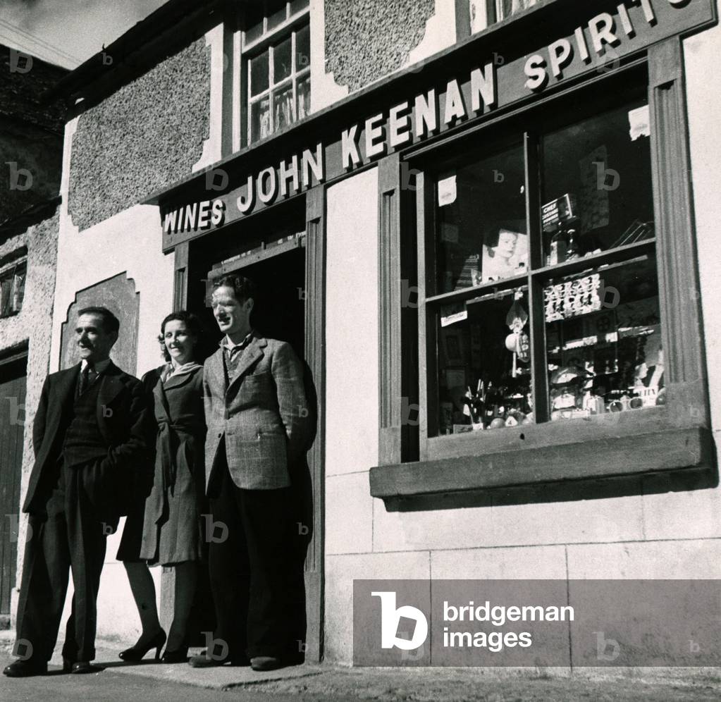 John Keenan Off Licence - Every tiny store, such as this in Carlingford, Eire is stocked to the full of whisky, gin, sherry, and brandy.
1963.