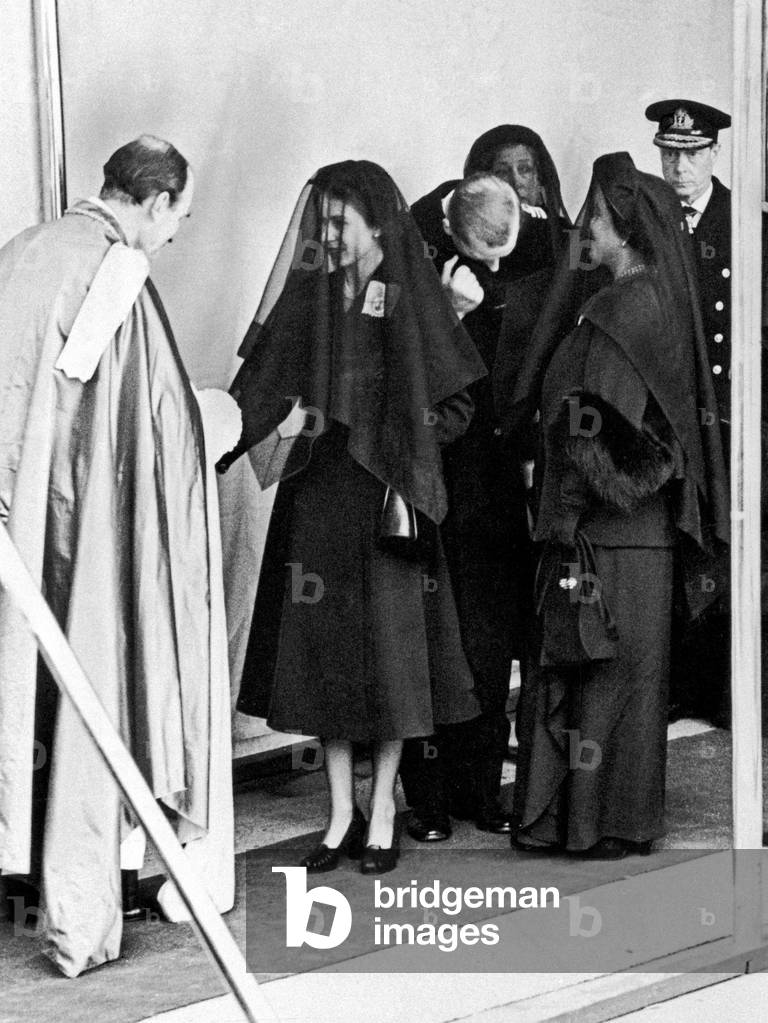 In mourning, the Queen at the funeral of her father, King George VI, in 1952. behind her are her husband, Prince Philip, and the Queen Mother with the Duke of Windsor (extreme right) 15th February 1952 (b/w photo)