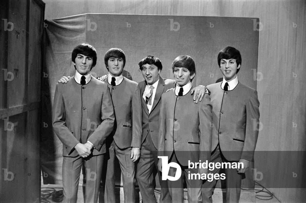 Ken Dodd with Madame Tussauds figures of the Beatles, May 1964