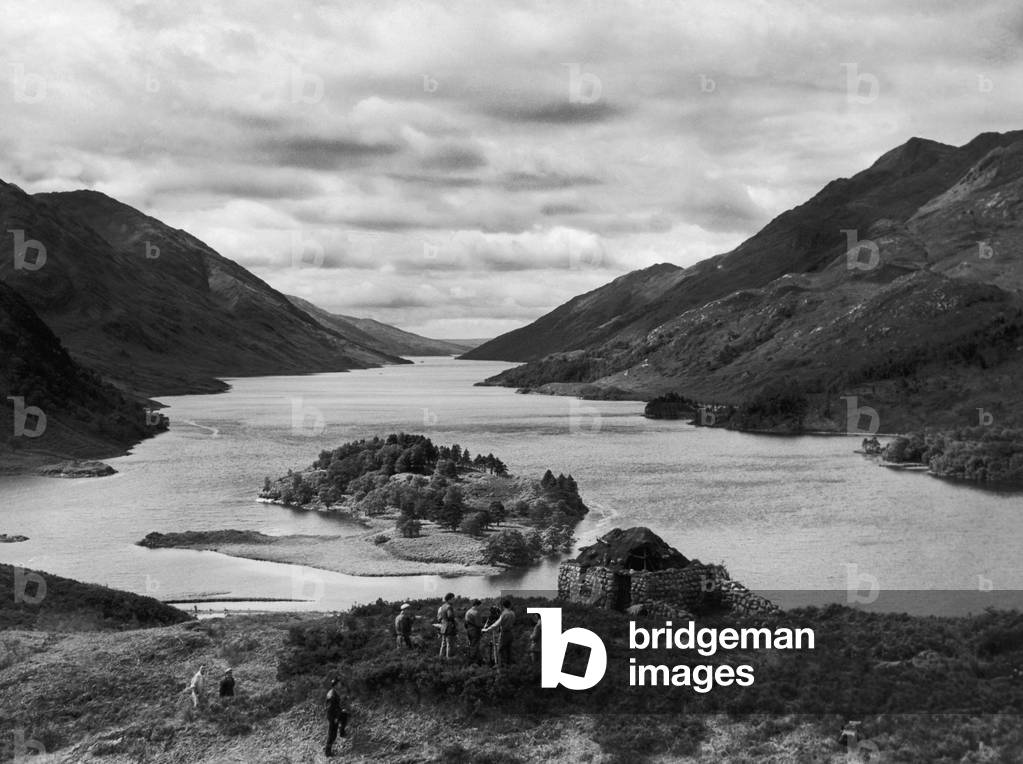 Tor Choicht, 500 feet above Loch Shiel a film crew prepare to film the gathering of the clanmen below at Glen Finnan for the film Bonnie Prince Charlie. The bothy in the foreground was built for the film, 14th August 1946 (b/w photo)