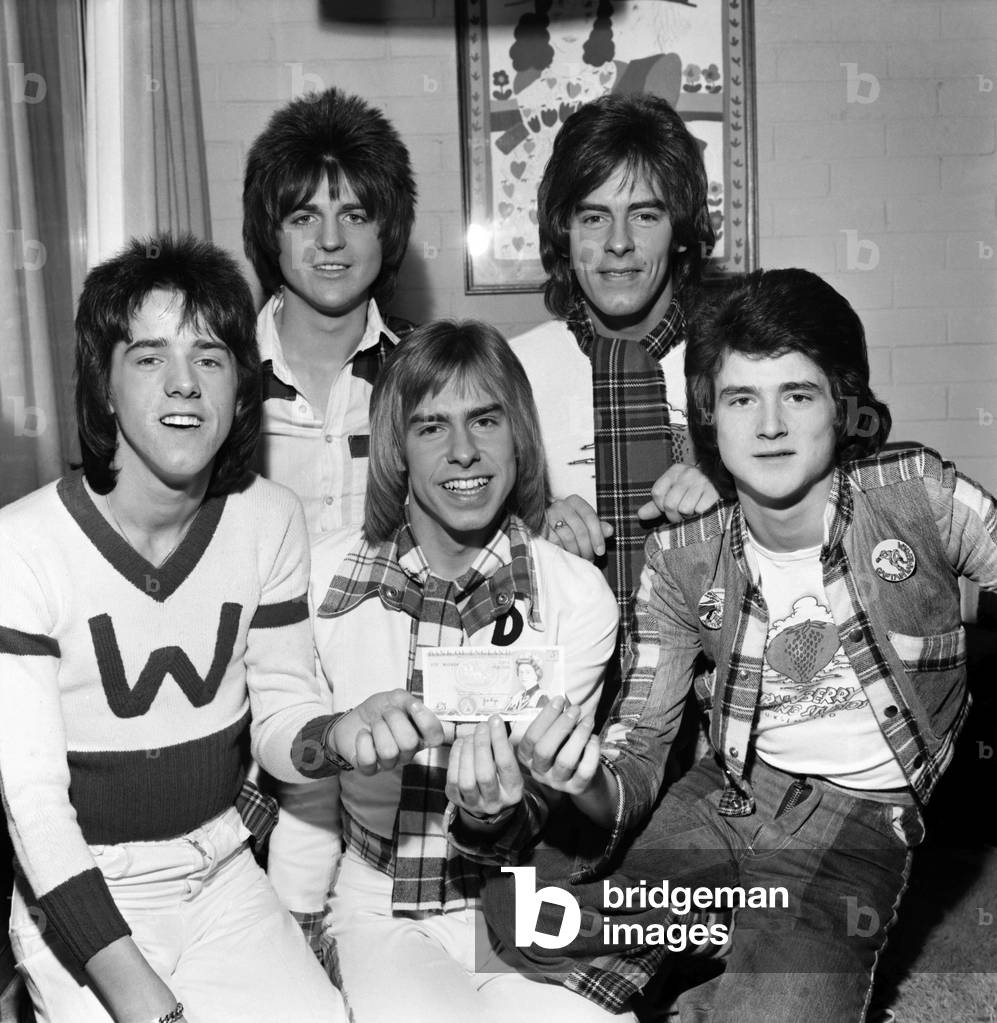 Bay City Rollers with the only cash between the Five of them - a Fiver!, 13th March 1975 (b/w photo)