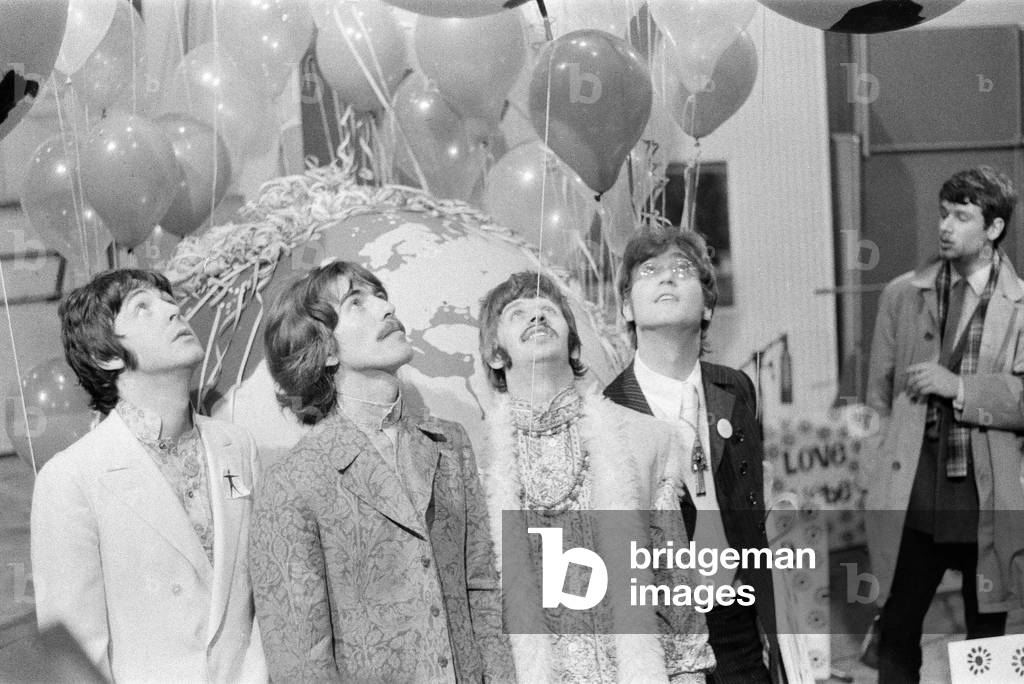 Press call for Our World, the first live global television link. Broadcast to 26 countries and watched by 400 million, the programme was broadcast via satellite on June 25, 1967. The BBC had commissioned the Beatles to write a song for the UK's contribution. 'All You Need Is Love' a song written by John Lennon and credited to Lennon/McCartney was first performed by The Beatles at this event & released as a single the following month. Pictured at Abbey Road Studios 24th June 1967 (b/w photo)