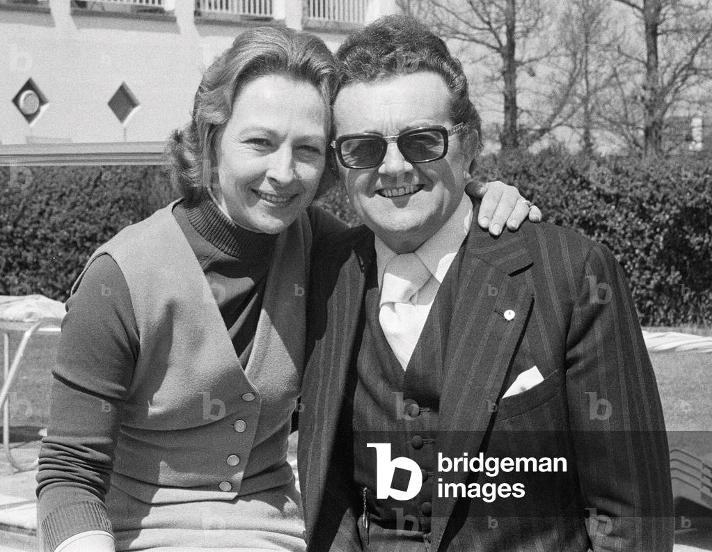 British musician Ronnie Ronalde pictured outside his hotel in St Martin, Guernsey with his wife Rosemarie.
14th May 1978.