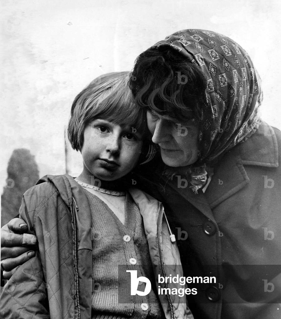 Aberfan - Landslide - Disaster - Mrs Mavis Perry, of Bryntaf, hugs her nine-year-old daughter, who climbed out through the roof of the wrecked school to safety - 21st October 1966