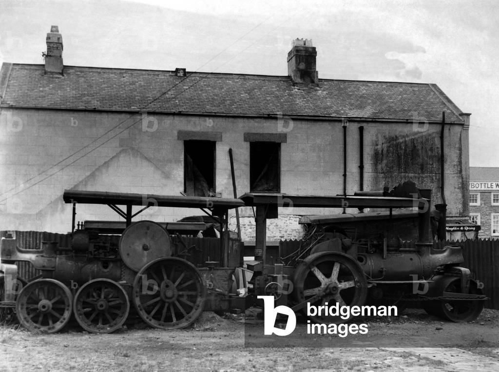 To a casual passer-by a small area off the village square in Newbottle, County Durham, looks like a steam rollers graveyard on 4th February 1964 (b/w photo)