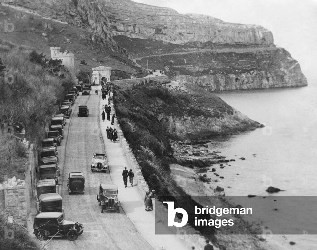 The residents of Llandudno seen enjoying a Easter walk along and drive along the improved road to The Great Orme 17th April 1933 (b/w photo)