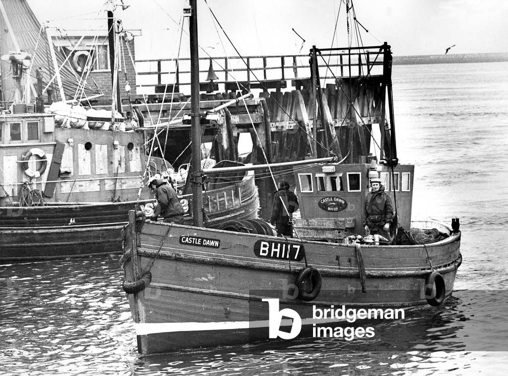 The fishing boat Castle jDawn arriving at North Shields Fish Quay in 1975 (b/w photo)