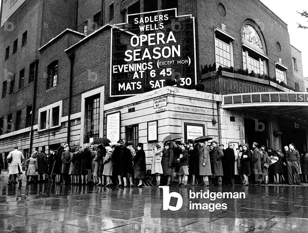 People queuing for the Opera Season at Saddlers Wells Theatre in London, 1946 (b/w photo)