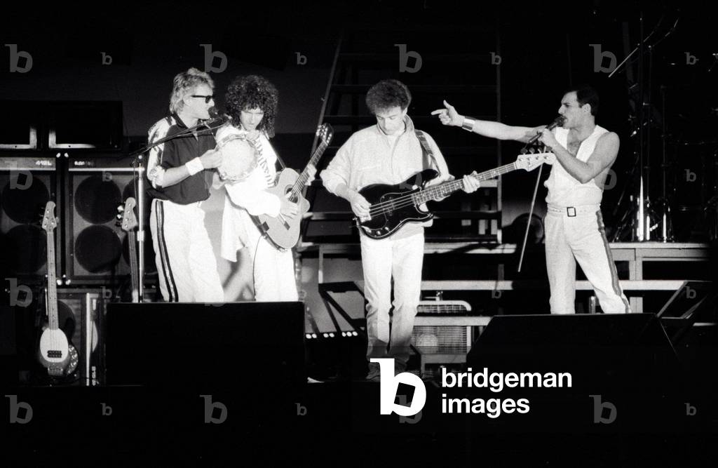Queen Rock Group Freddie Mercury, Brian May, John Deacon & Roger Taylor. Queen in concert at St James Park in Newcastle, 09/07/1986 (b/w photo)