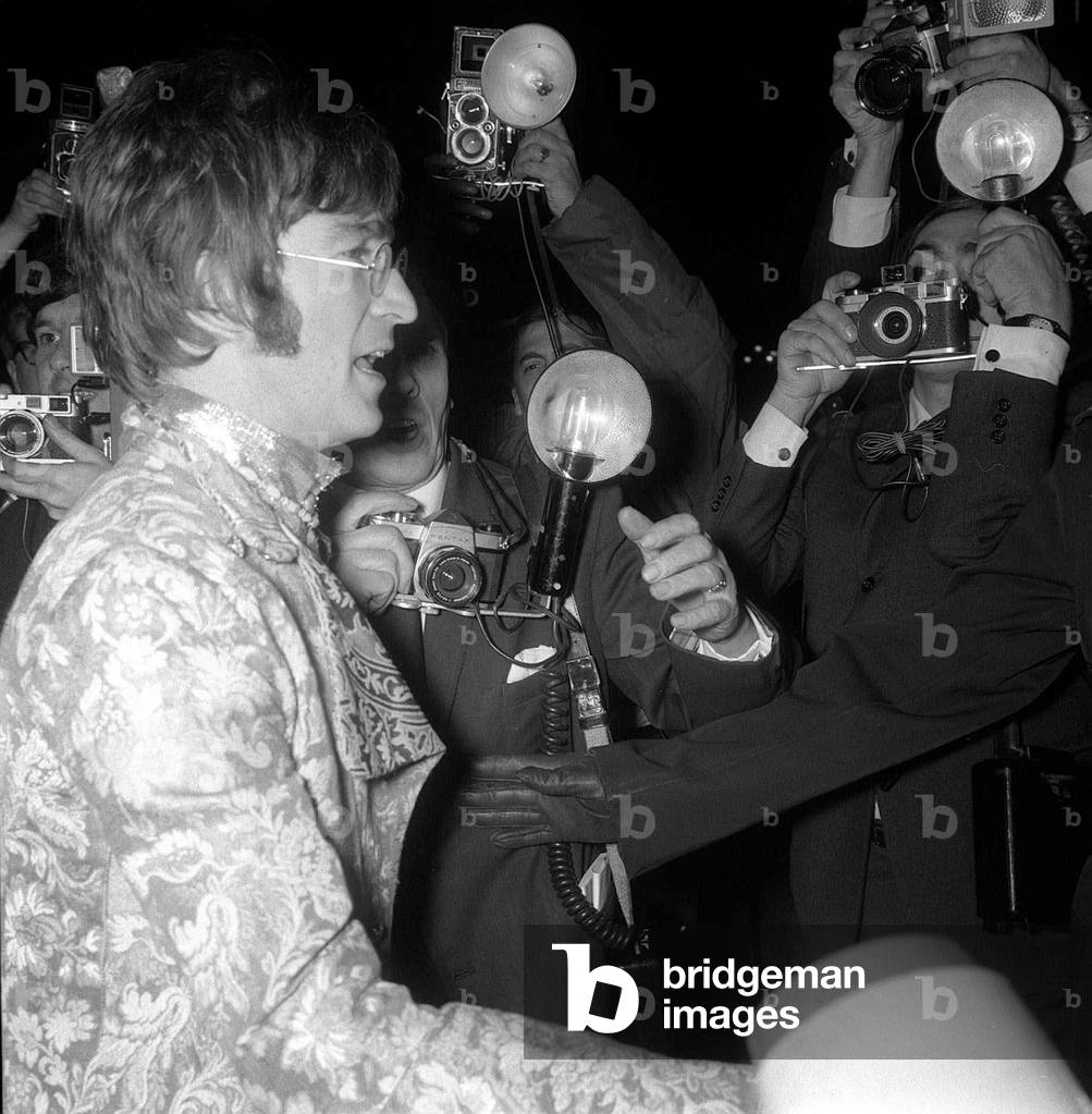 John Lennon of the Beatles attends the Film Premiere 