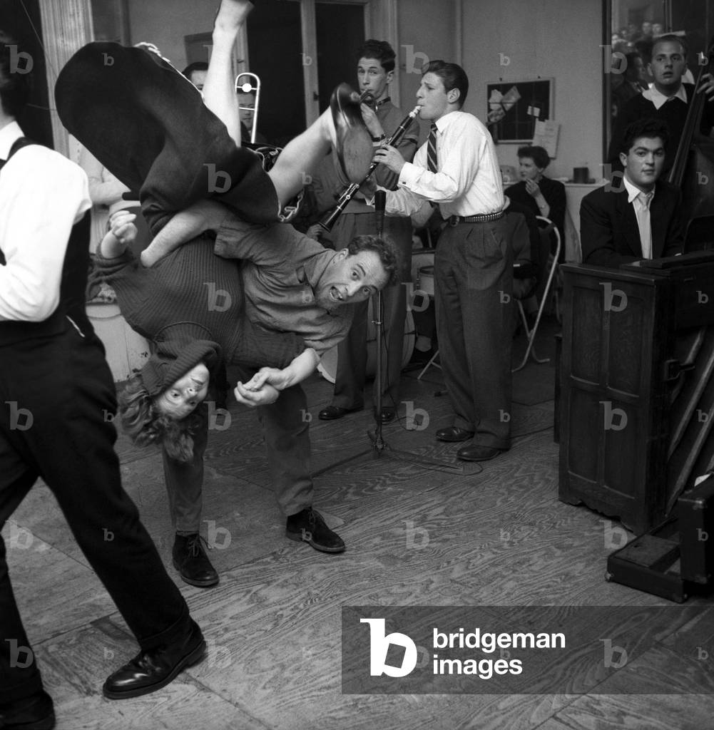 The London Jive Club in Baker Street is probably the only club which has a dancing school held on weekday evenings to teach not only ballroom dancing, but Jive, Jitterbug, skiffle and any other new dance that comes along. Every Saturday and Sunday the pupils have their own dance with a resident Jazz band and Jive records brought along by pupils and played on a radio-gram. The hot rhythm of the Jazz section really 