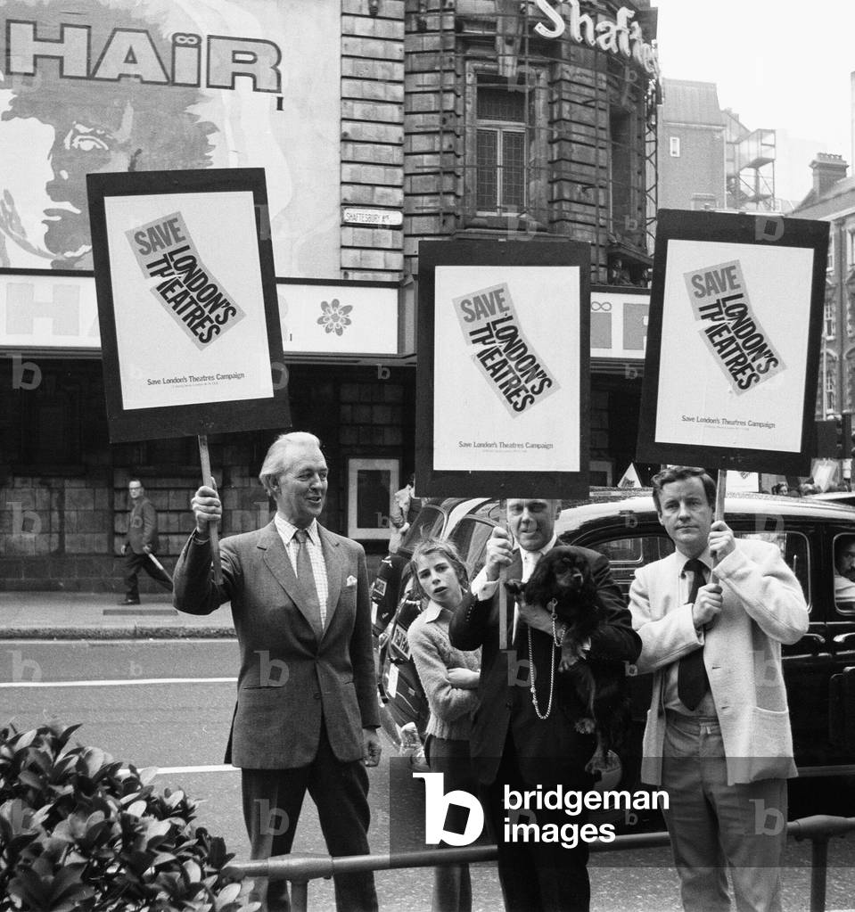 Actors (left to Right) Michael Dennison, Marius Goring and Richard Briers demonstrate outside the Shaftesbury Theatre, London which is threaten with closure and demolition. 6th October 1973 (b/w photo)