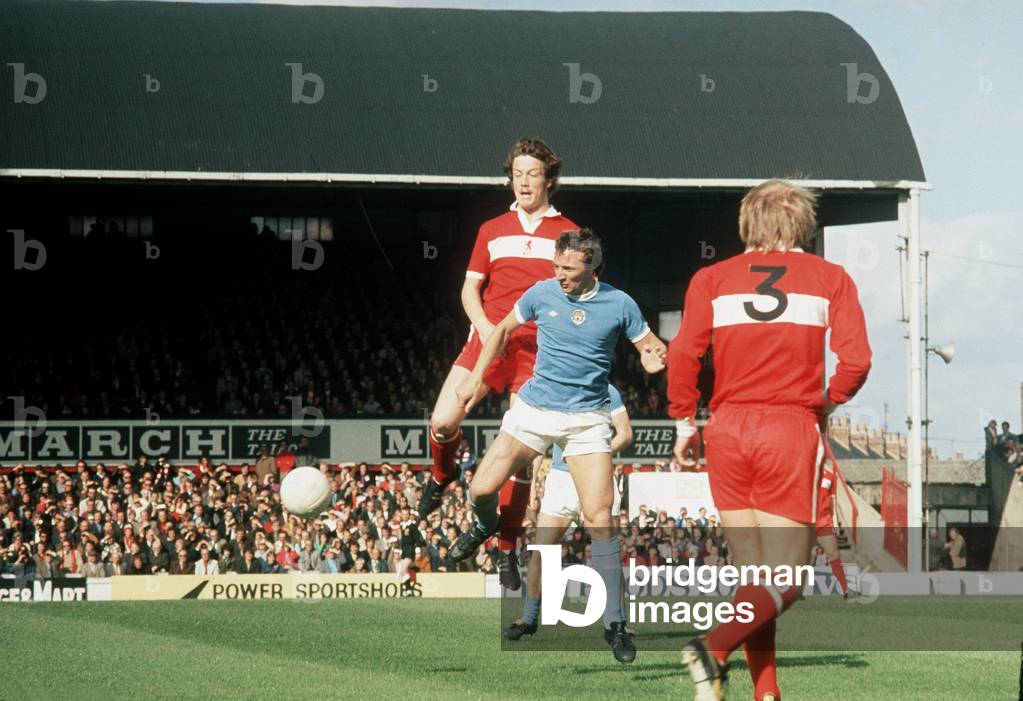 Mike Summerbee in action for Manchester City against Middlesbrough, 1974 (b/w photo)